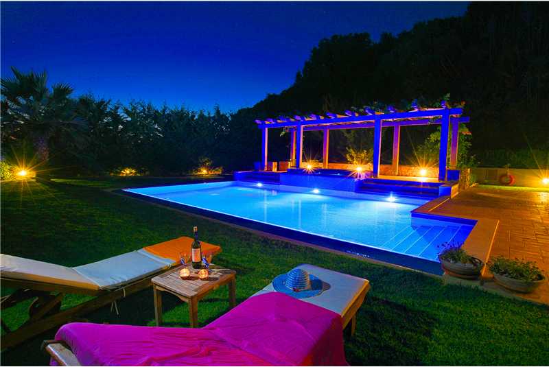 Villa Elina pool and jacuzzi at night
